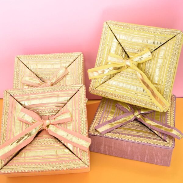 This fabric gotta Patti box is a perfect addon for your mithai distribution this wedding and festive season! Its traditional, classy, elegant and perfect!