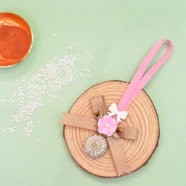 pink gold Lumba Rakhi for sister